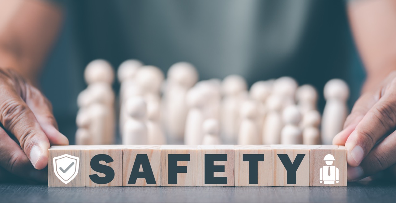 ISO 45001 Strategies- Engineers hold a wooden block on a table, demonstrating safe operation, maintenance, health care, equipment and equipment inspection, to prevent potential hazards.