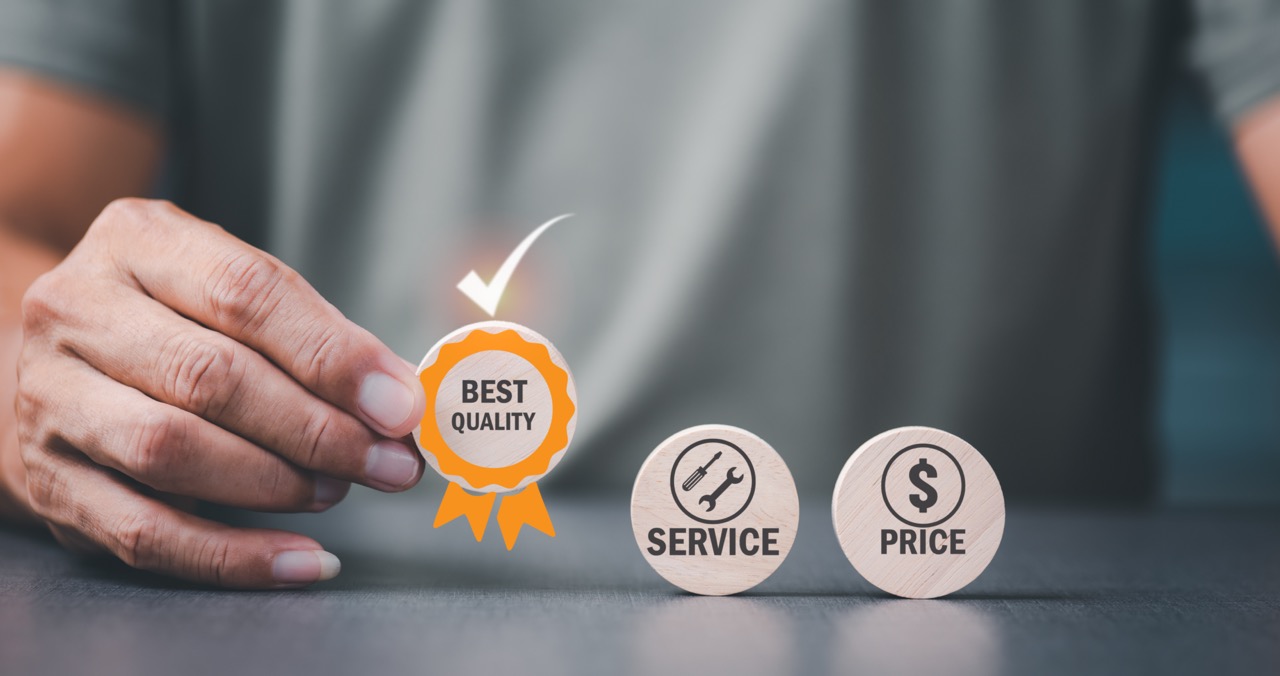 Quality Manager- Young business owner holding circle wooden block in hand, best quality business idea, management and improvement of excellent products and services. to develop industry standards for success